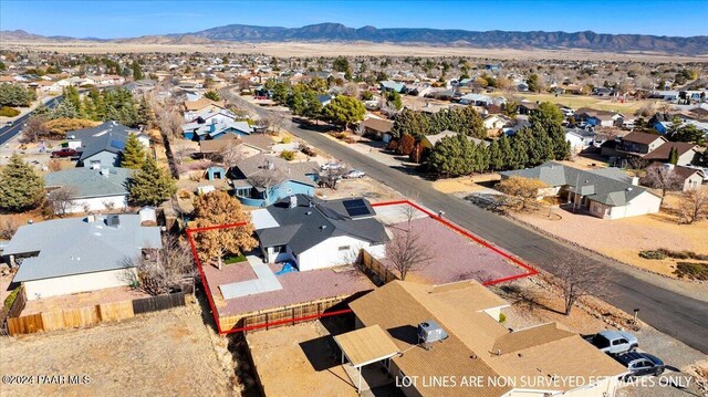 drone / aerial view featuring a mountain view