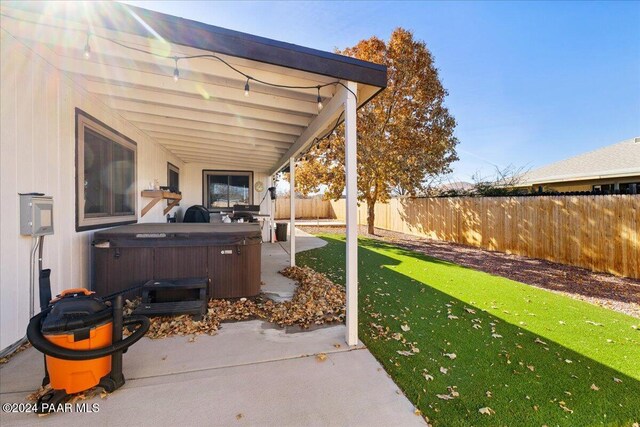 view of patio featuring a hot tub