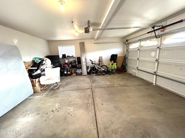 garage featuring a garage door opener