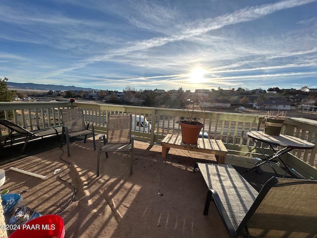 wooden terrace featuring a mountain view