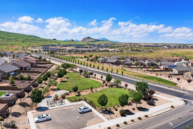 drone / aerial view with a mountain view and a residential view