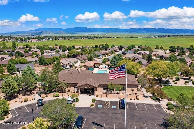 drone / aerial view featuring a mountain view