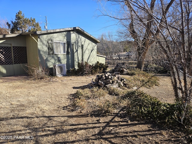 view of home's exterior featuring ac unit