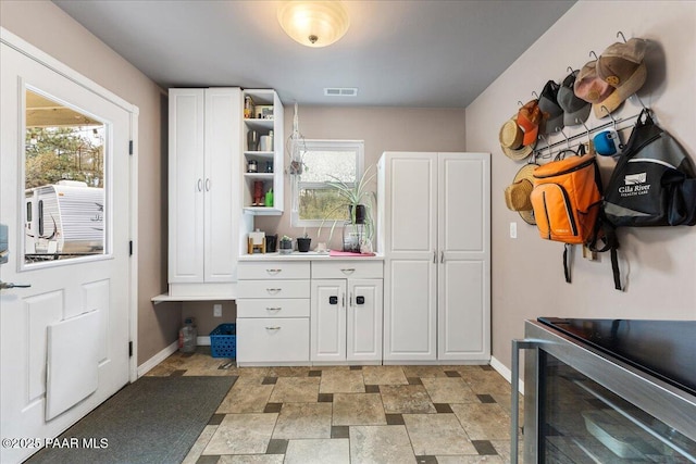 mudroom with a healthy amount of sunlight