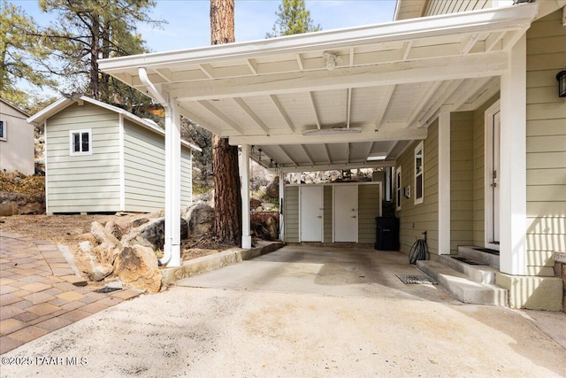 view of parking / parking lot with a carport