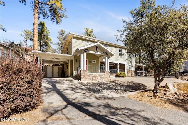 view of front of home featuring a carport