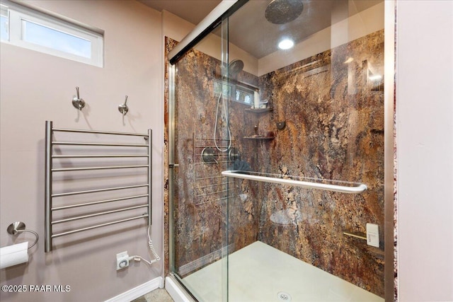 bathroom featuring walk in shower and radiator heating unit