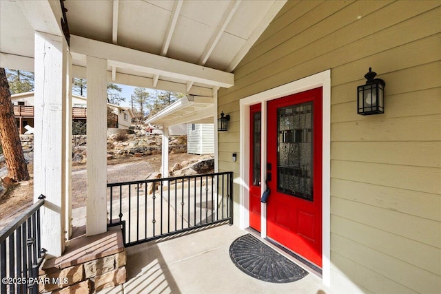 entrance to property featuring covered porch