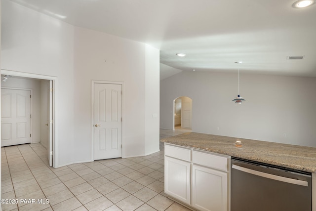 920 Heather Ln, Chino Valley, AZ 86323 - kitchen featuring dishwasher, arched walkways, white cabinetry, light tile patterned flooring, and lofted ceiling