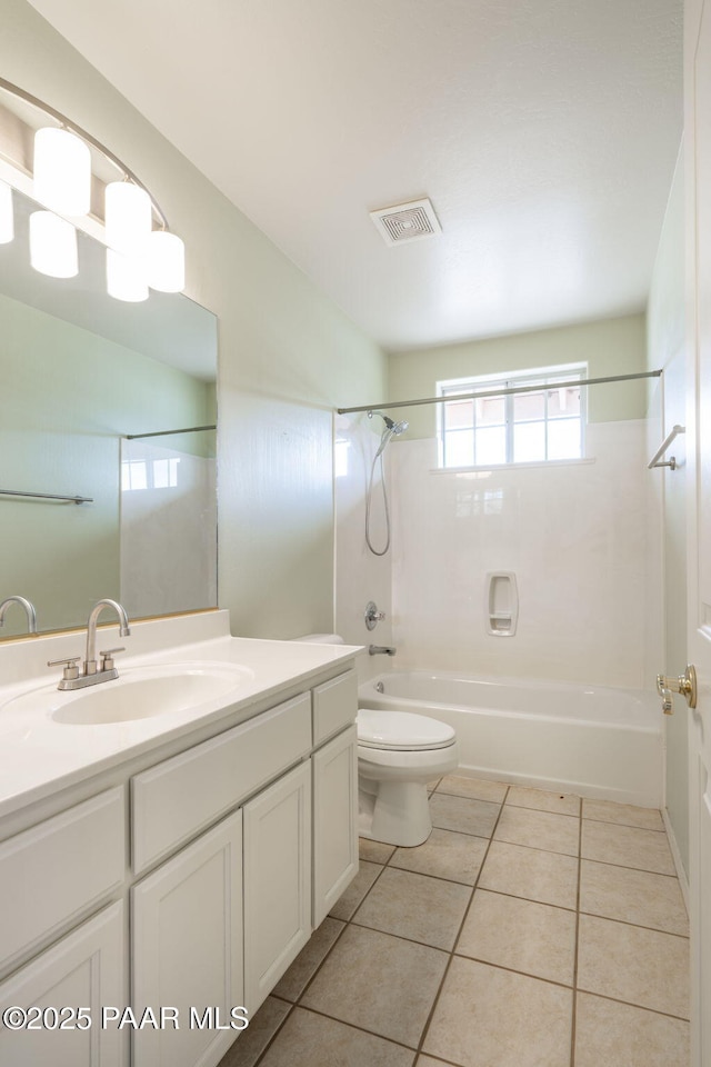 920 Heather Ln, Chino Valley, AZ 86323 - bathroom with tub / shower combination, vanity, tile patterned floors, and toilet