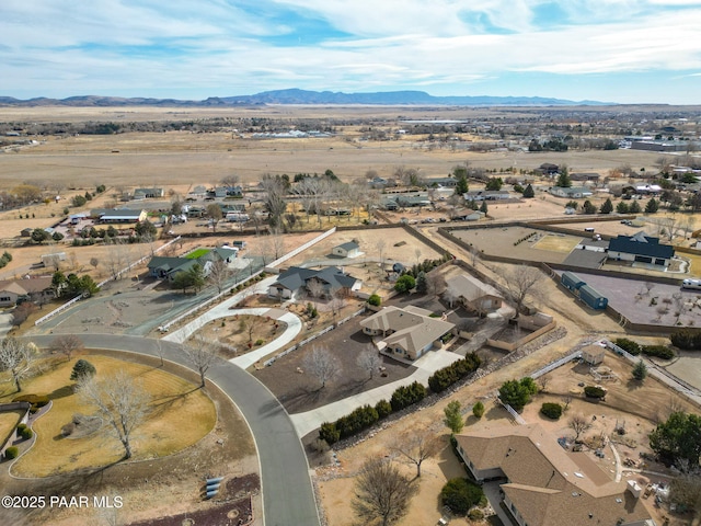 920 Heather Ln, Chino Valley, AZ 86323 - aerial view of property and surrounding area with a mountainous background, nearby suburban area, and a desert landscape