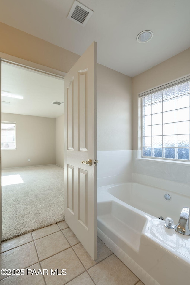 920 Heather Ln, Chino Valley, AZ 86323 - bathroom featuring a bath and tile patterned flooring