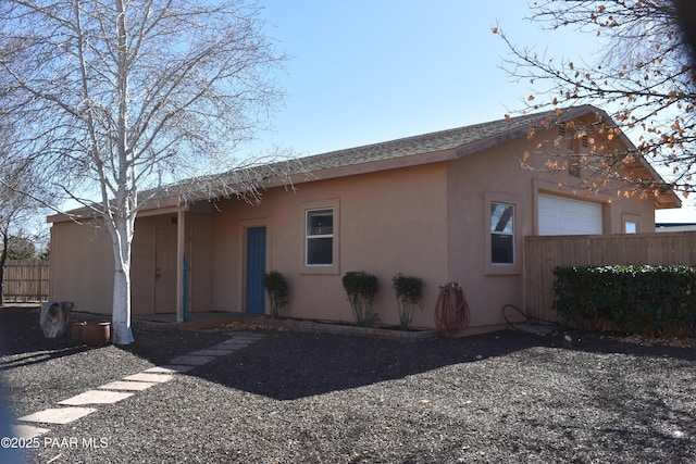 920 Heather Ln, Chino Valley, AZ 86323 - back of property featuring stucco siding and a garage