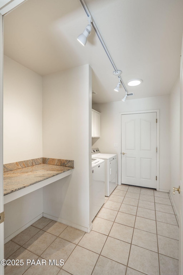 920 Heather Ln, Chino Valley, AZ 86323 - laundry room featuring track lighting, independent washer and dryer, cabinet space, and light tile patterned flooring