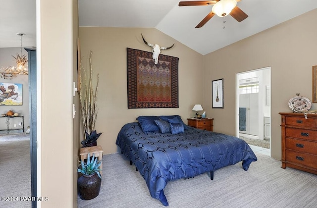 bedroom with ceiling fan with notable chandelier, light carpet, connected bathroom, and lofted ceiling