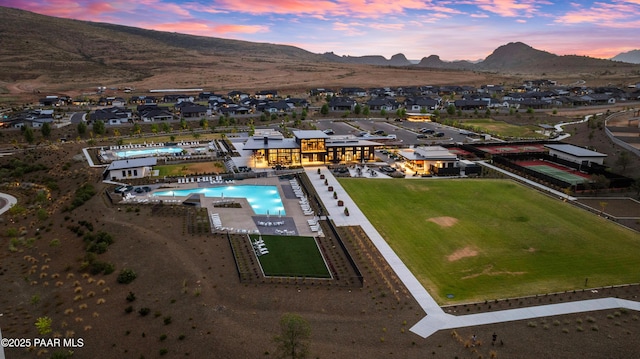 aerial view at dusk with a mountain view