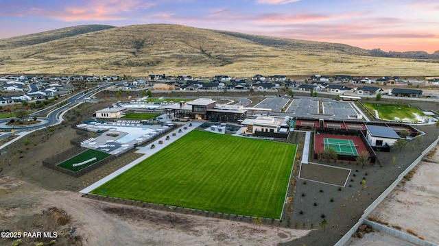 aerial view at dusk with a mountain view