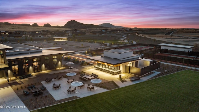 aerial view at dusk with a mountain view