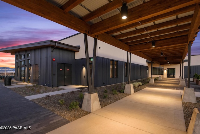 view of property exterior at dusk