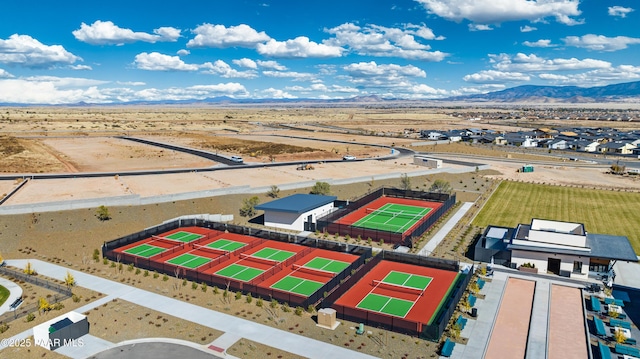 birds eye view of property featuring a mountain view