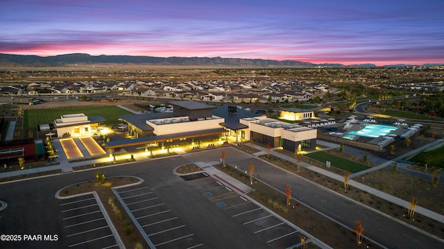 aerial view at dusk with a mountain view