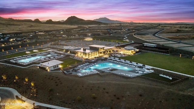 aerial view at dusk with a mountain view