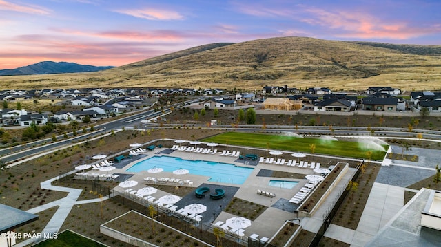 aerial view at dusk with a mountain view