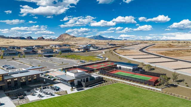 drone / aerial view featuring a mountain view