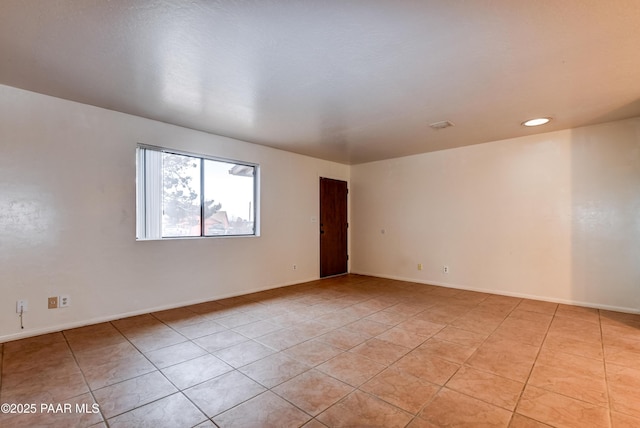 view of tiled empty room