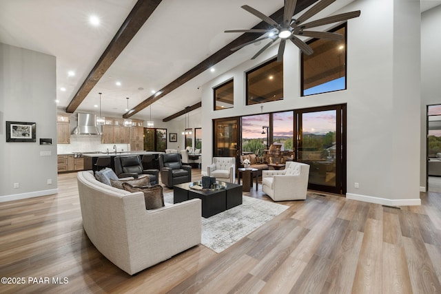 15425 N Talking Rock Ranch Rd, Prescott, AZ 86305 - living room featuring ceiling fan, beamed ceiling, light wood-style floors, recessed lighting, and high vaulted ceiling
