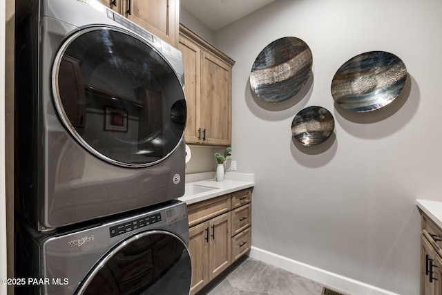 15425 N Talking Rock Ranch Rd, Prescott, AZ 86305 - laundry room featuring cabinet space and stacked washing machine and dryer