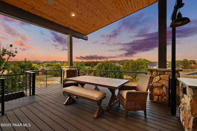 15425 N Talking Rock Ranch Rd, Prescott, AZ 86305 - deck at dusk with outdoor dining space