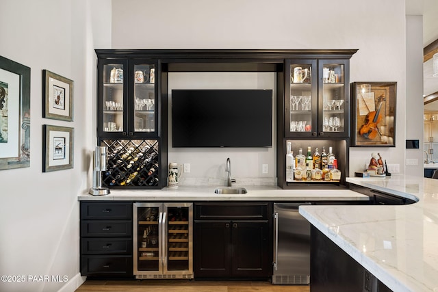 15425 N Talking Rock Ranch Rd, Prescott, AZ 86305 - indoor wet bar with beverage cooler and light wood finished floors