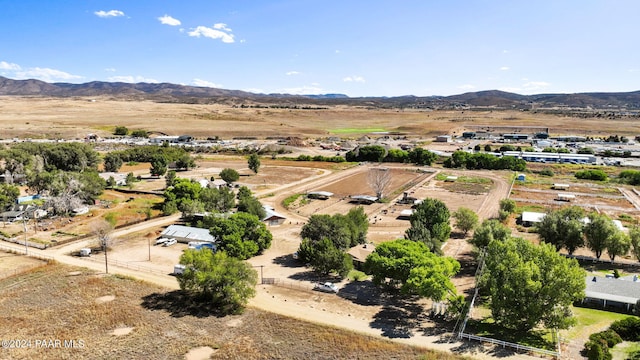 birds eye view of property featuring a mountain view