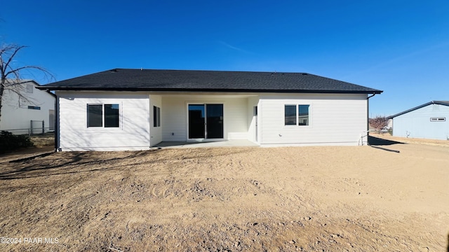 rear view of property featuring a patio area