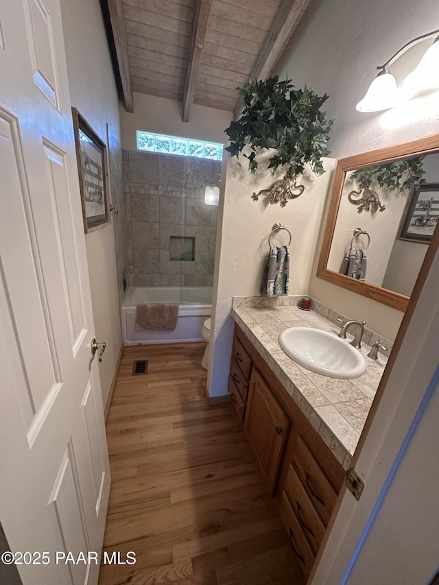 13502 S Burton Rd, Mayer, AZ 86333 - full bath featuring vanity, wood finished floors, a tub, and a wood ceiling with exposed beams