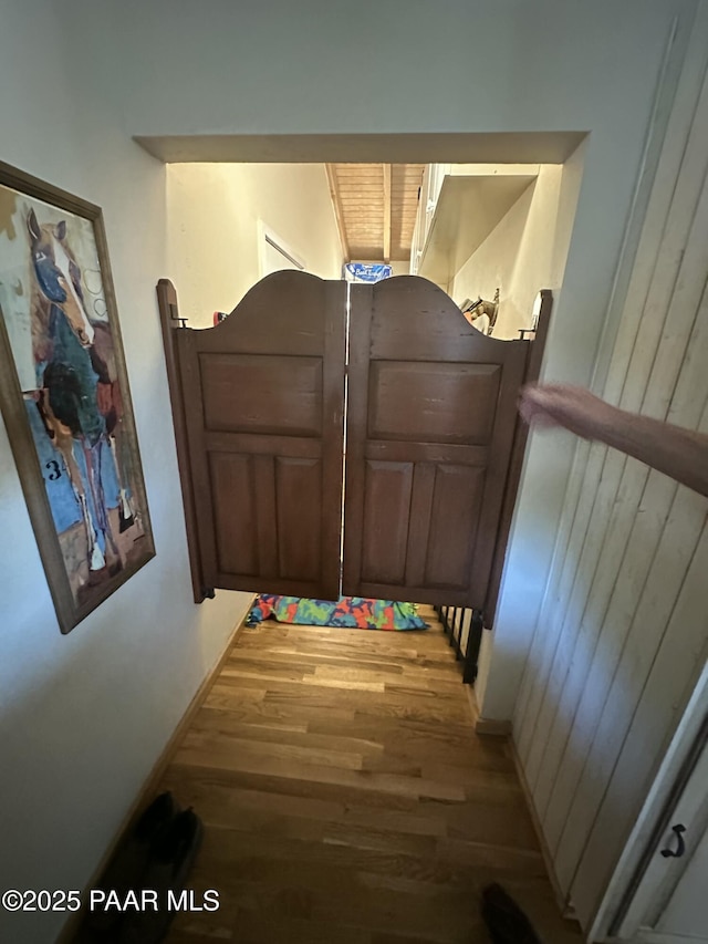 13502 S Burton Rd, Mayer, AZ 86333 - stairs with wood finished floors and baseboards