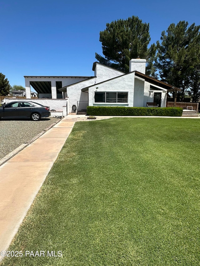 13502 S Burton Rd, Mayer, AZ 86333 - view of front of house with a chimney and a front yard