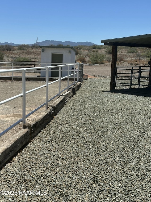 13502 S Burton Rd, Mayer, AZ 86333 - view of yard with a mountain view, an outbuilding, and an exterior structure