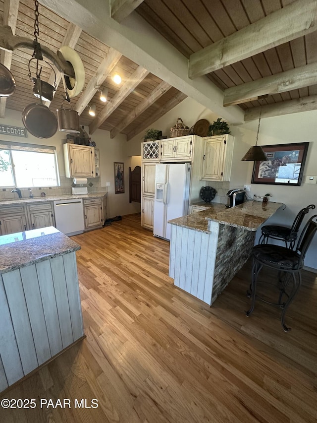 13502 S Burton Rd, Mayer, AZ 86333 - kitchen with white appliances, wood ceiling, a peninsula, backsplash, and light wood finished floors