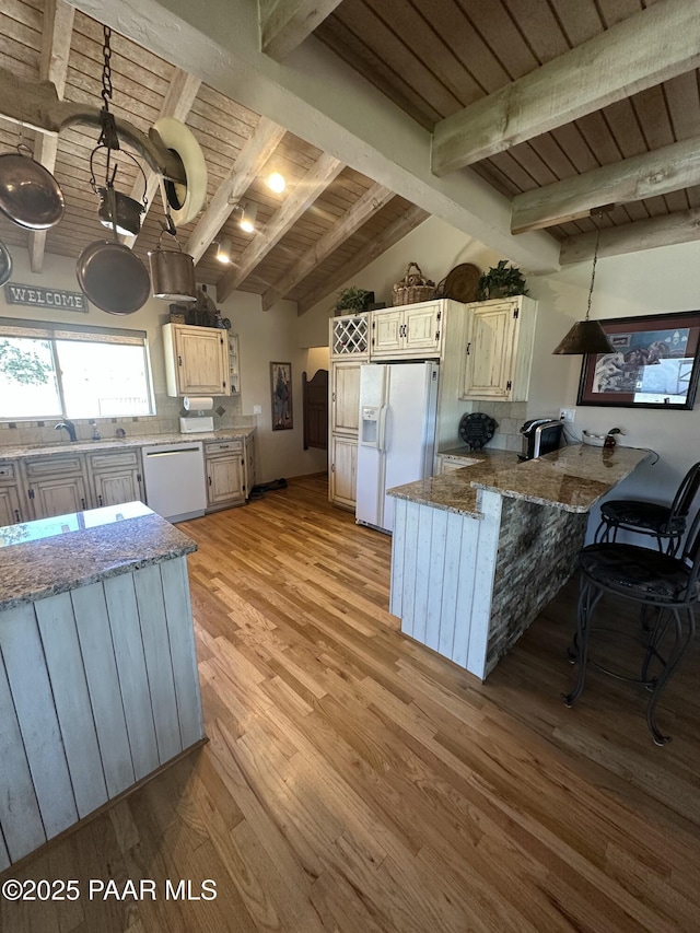 13502 S Burton Rd, Mayer, AZ 86333 - kitchen with white appliances, wood ceiling, a peninsula, backsplash, and light wood-style flooring