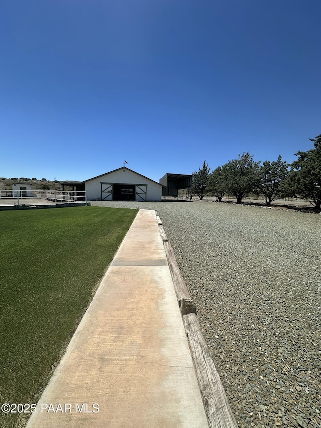 13502 S Burton Rd, Mayer, AZ 86333 - view of green lawn with an outbuilding and a pole building