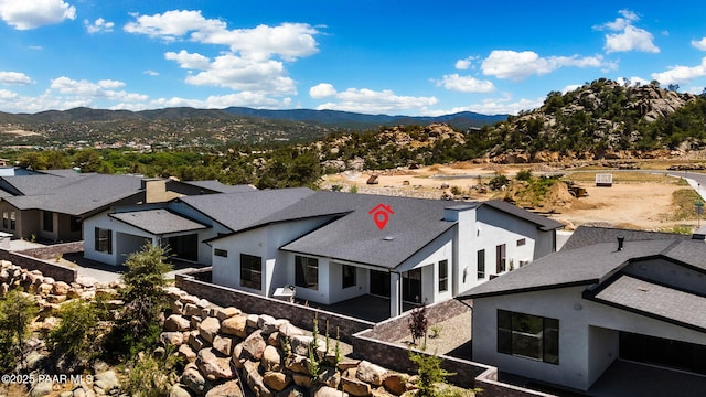 drone / aerial view with a mountain view and a residential view