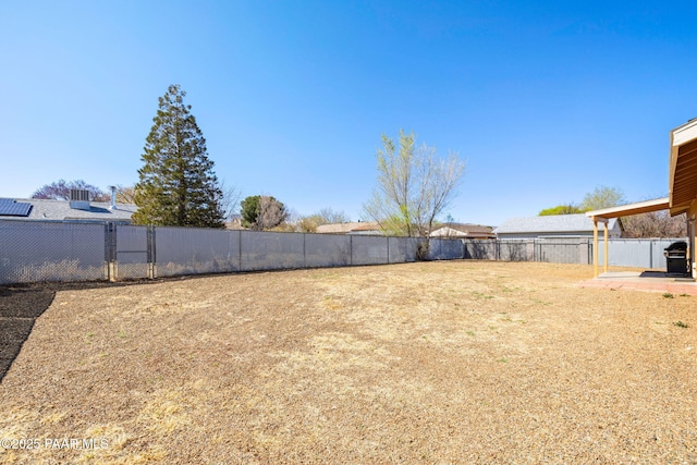 view of yard featuring a fenced backyard