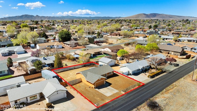aerial view featuring a mountain view and a residential view