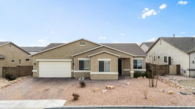 ranch-style house featuring a garage