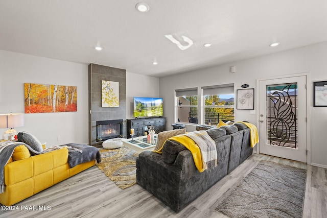 983 N Rolling Green Rd, Dewey-Humboldt, AZ 86327 - living area featuring recessed lighting, a tiled fireplace, and wood finished floors