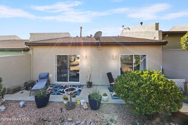 rear view of property with a patio