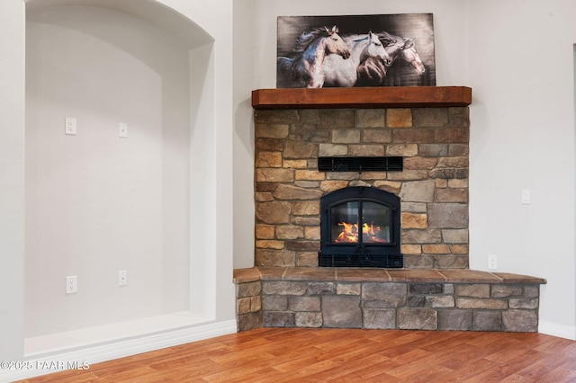 16025 N Hereford Rd, Chino Valley, AZ 86323 - detailed view of a stone fireplace, wood finished floors, and baseboards