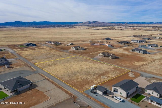 drone / aerial view featuring a mountain view